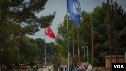 Darbasiyah lies right on the border with Turkey, and some locals fear it will meet the same fate as Ras al-Ayn, another city governed by Kurds that is now held by Turkish-backed fighters, in Darbasiyah, Oct. 22, 2019. (VOA/Yan Boechat)