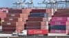 Shipping containers are stacked high at the Port of Long Beach on March 4, 2025 in Long Beach, California, as US President Donald Trump's tariffs on Canada and Mexico take effect.