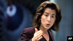 U.S. Commerce Secretary Gina Raimondo speaks on Dec. 11, 2023, during an appearance in Nashua, New Hampshire. Raimondo and the Commerce Department are under fire from congressional critics who say they aren't doing enough to keep China from acquiring U.S. chip technology.