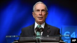 FILE - Former New York Mayor Michael Bloomberg speaks during the C40 cities awards ceremony, in Paris, Dec. 3, 2015.