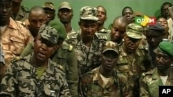 Renegade Malian soldiers appear on television at the ORTM television studio in Bamako, March 22, 2012 still image taken from video. 