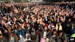 People attend the funeral of Pakistani Sunni Muslim cleric Masoodur Rehman Usmani in Islamabad, Pakistan, on Jan. 6, 2024.
