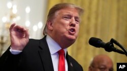 Presiden AS Donald Trump bertekad akan memveto resolusi hendak memblokir keadaan darurat nasional yang ia deklarasikan. 