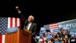 FILE - Democratic presidential candidate Sen. Bernie Sanders, I-Vt., gestures to supporters during a campaign rally in Laramie, Wyo., Tuesday, April 5, 2016.