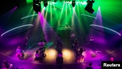 People attend the first "corona-proof" dance event following the coronavirus disease outbreak in Nijmegen, Netherlands, June 6, 2020. 