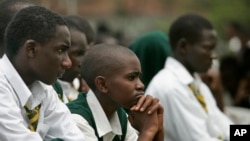 FILE - Students at Jamhuri High School in Nairobi, Kenya, are seen listening to a speech, Feb. 11, 2008. Newly-released results show that just 15 percent of the more than half-million students who in 2016 applied to enter university passed the entrance exam.