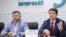Dmytro Razumkov (R) and Oleksandr Korniyenko, leaders of Ukrainian President Volodymyr Zelenskiy's political party Servant of the People, speak at a news conference in Kyiv, Ukraine, May 27, 2019.