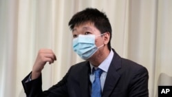 Wang Jingyu speaks during an interview in a safe house in the Ukraine on June 30, 2021. 