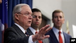 FILE - U.S. Attorney General Jeff Sessions speaks during a news conference regarding the country's opioid epidemic, Aug. 22, 2018, in Cleveland. 
