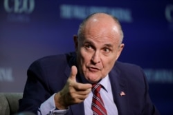 FILE - Rudy Giuliani speaks at the Wall Street Journal CEO Council in Washington, Nov. 14, 2016.