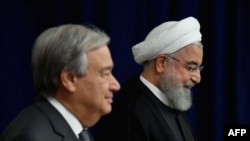 President of Iran Hassan Rouhani, right, meets with United Nations Secretary-General Antonio Guterres at the United Nations in New York, Sept. 25, 2019.