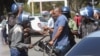 Zimbabwe Police Use Tear Gas to Violently Break Up Protests