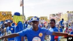 Supporters of Chadian President Idriss Deby Itno gather for a rally in N'djamena, Chad, Friday April 9, 2021. Deby is seeking to extend his three-decade long rule, running for a sixth time in this oil-producing Central African nation.