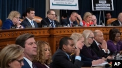 House Judiciary Committee Chairman Jerrold Nadler, D-N.Y., top center, and Rep. Doug Collins, R-Ga., the ranking member, right, makes his opening statement 