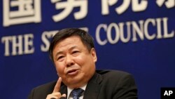 Chinese Finance Vice Minister Zhu Guangyao speaks during a press conference on Sino-US trade issues at the State Council Information Office in Beijing, April 4, 2018. 