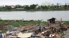 A view of the floating houses being demolished in Prek Pra commune, Chbar Ampov district, Phnom Penh, June 12, 2021. (Vicheika Kann/VOA)