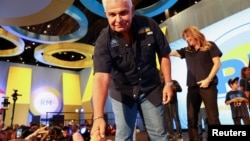 Presidential candidate Jose Raul Mulino greets his supporters after he was declared the winner of the presidential election based on preliminary results by the electoral authority, in Panama City, Panama, May 5, 2024. 