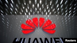 FILE - A Huawei company logo is pictured at Shenzhen International Airport in Shenzhen, Guangdong province, China, July 22, 2019.