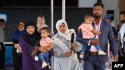 Members of the Muslim community leave after attending a national remembrance service in Christchurch on March 13, 2021, to mark two years since the March 15, 2019, Christchurch mosque attacks in which 51 people were killed and dozens were injured. 