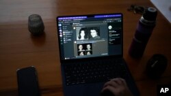 The computer screen of Santiago Barros shows old photographs of couple Maria Eugenia Gonzalez and Nestor Oscar Junquera, who disappeared during dictatorship, above AI-generated images of what their stolen son might look like today, in Buenos Aires, Argentina, Aug. 2, 2023. 