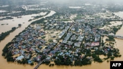 This aerial picture shows flooded streets and buildings in Thai Nguyen, Vietnam, on Sept. 10, 2024, a few days after Super Typhoon Yagi hit northern Vietnam.