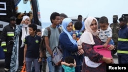 American nationals arrive for evacuation from the port, as clashes between the paramilitary Rapid Support Forces and the Sudanese army continue, in Port Sudan, Sudan, April 30, 2023. (Stringer/REUTERS)