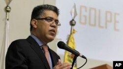 Venezuela's Foreign Minister Elias Jaua speaks during a news conference at the Venezuelan Embassy in Brasilia, Brazil, Friday, Feb. 28, 2014.
