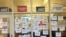 Anti-Trump messages are seen posted on window panels outside the GOP Badgers' room at the Student Activities Center on campus at the University of Wisconsin-Madison. (J. Kiah)