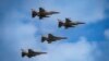 Винищувачі F16 ВПС Румунії та румунського Європейського навчального центру F-16 (EFTC), який також готуватиме українських пілотів, Бухарест, Румунія, 22 травня 2024 р. AP Photo/Vadim Ghirda