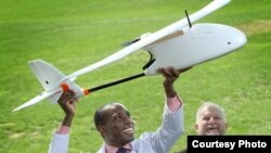 Pathologist Timothy Amukele, left, teamed with Robert Chalmers and other engineers to create a drone courier system that transports blood to diagnostic laboratories. (Credit: Johns Hopkins Medicine)