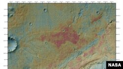 The area where NASA's Curiosity rover will land on Aug. 5 PDT (Aug. 6 EDT) has a geological diversity that scientists are eager to investigate, as seen in this false-color map based on data from NASA's Mars Odyssey orbiter.