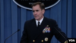 FILE- Pentagon spokesman Rear Admiral John Kirby speaks at a news briefing about the situation in Iraq, at the Pentagon, June 13, 2014.