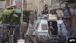 Des policiers égyptiens dans le nord du Sinaï, le 26 juillet 2018.