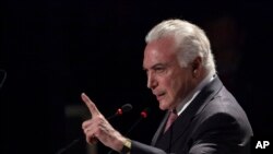 Brazil's President Michel Temer speaks during a ceremony in Brasilia, Brazil, July 11, 2017. 