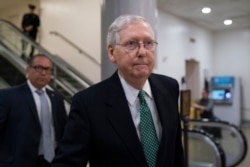 Senate Majority Leader Mitch McConnell, R-Ky., heads to a briefing with Secretary of State Mike Pompeo, Defense Secretary Mark Esper and other national security officials.