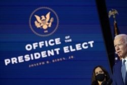 U.S. President-elect Joe Biden and Vice President-elect Kamala Harris face reporters after meeting with members of their coronavirus disease "Transition COVID-19 Advisory Board" in Wilmington, Delaware, Nov. 9, 2020.