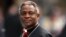 Cardinal Peter Kodwo Appiah Turkson of Ghana arrives to attend a mass led by bishop Leonardo Sandri of Argentina in St. Peter's Basilica at the Vatican April 13, 2005.