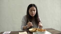 Amy Loh works near Swee Bee by Baker Dave, and has been a regular at the cafe for more than three years. (Dave Grunebaum/VOA)