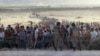IS Attacks Send Thousands of Syrian Kurds Fleeing to Turkey