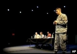 Maj. Joseph Geraci speaks at a town hall-style discussion following a 'Theater of War,' performance.