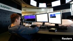 FILE - An employee works at the headquarters of Kaspersky Lab, a computer security company in Moscow.