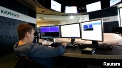 FILE - An employee works at the headquarters of Kaspersky Lab, a computer security company, in Moscow, Russia, July 29, 2013.