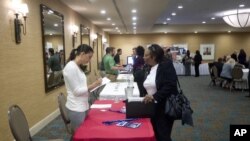 The U.S. economy added a solid 146,000 jobs in November and the unemployment rate fell to 7.7 percent, the lowest since December 2008, the Labor Department announced, Dec. 7, 2012.