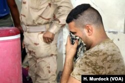 In Old Mosul, dead IS militants are scattered in houses and on the streets and the smell is overwhelming in 45-plus degree Celsius weather on July 13, 2017 in Mosul.