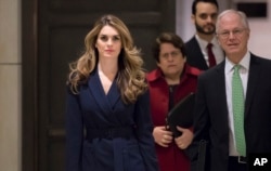 FILE - Then-White House Communications Director Hope Hicks arrives to meet behind closed doors with the House Intelligence Committee, at the Capitol in Washington, Feb. 27, 2018.