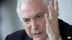 Brazil's President Michel Temer speaks during a breakfast with foreign correspondents in the presidential residence in Brasilia, Brazil, Dec. 6, 2018. 