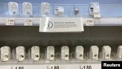 Empty shelves are seen at a supermarket in Watford, Britain, March 11, 2020. 