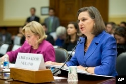 Assistant Secretary for European and Eurasian Affairs Victoria Nuland, right, accompanied Assistant Secretary of State for Near Eastern Affairs Anne Patterson, testifies on Capitol Hill in Washington, Nov. 4, 2015, before the House Foreign Affairs Committ