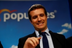 FILE - People's Party (PP) candidate Pablo Casado speaks in Madrid, Spain, April 28, 2019.