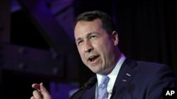 FILE - In this March 3, 2020, photo, Democratic U.S. Senate candidate Cal Cunningham speaks to supporters during a primary election night party in Raleigh, N.C. 